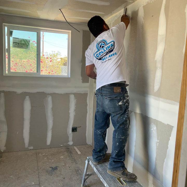 Container house build drywall