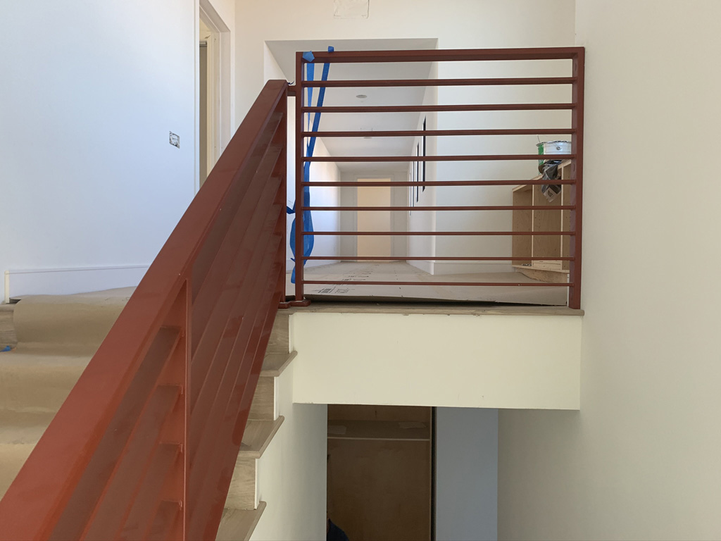 Interior stair rail painting