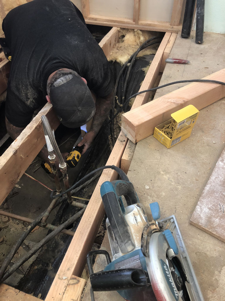 Shower build laying pipe