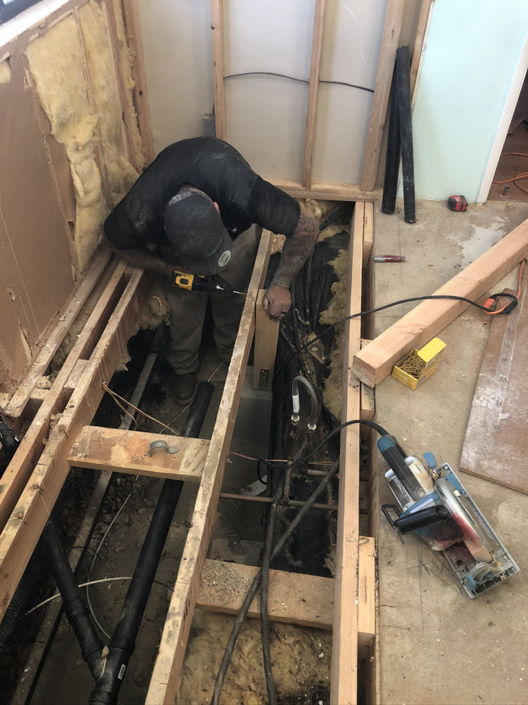 Shower build laying pipe
