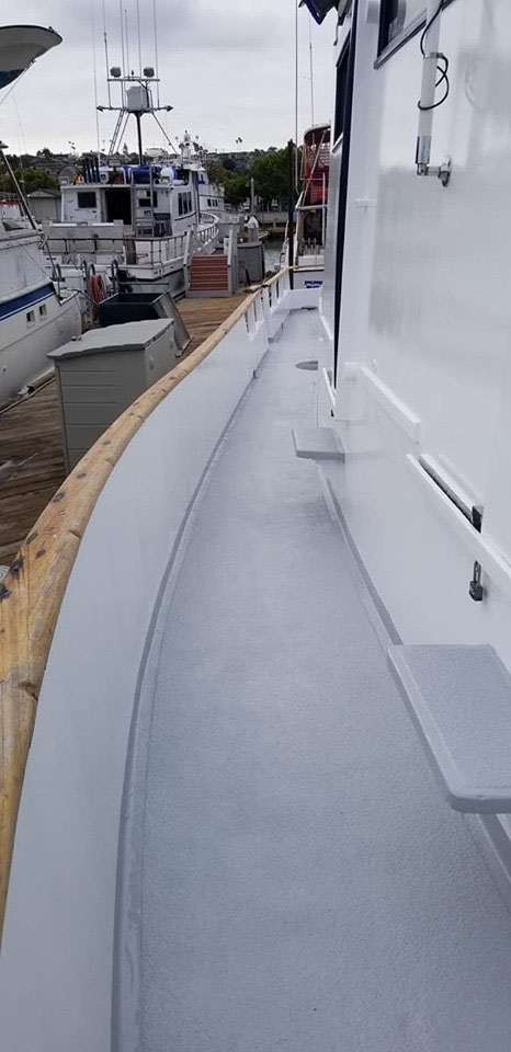 Painted side of boat cabin and deck