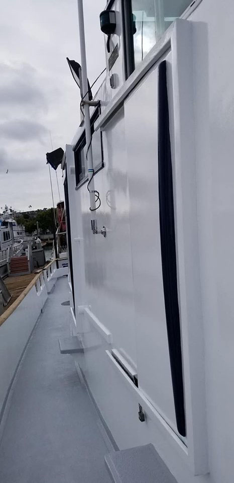 Painted side of boat cabin and deck