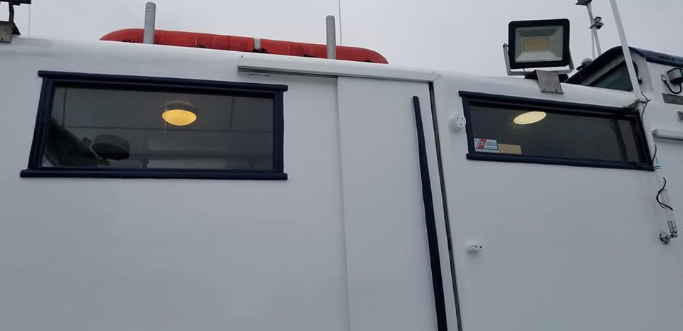 Painted side of boat cabin